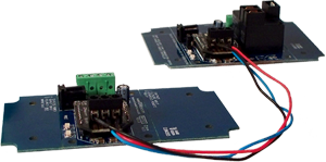 Connect the two boards up to 1000' feet with RJ11 Cable