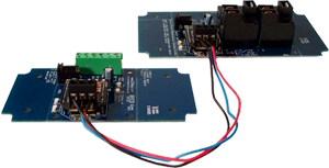 Connect the two boards up to 1000' feet with RJ11 Cable