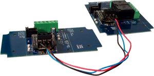 Connect the two boards up to 1000' feet with RJ11 Cable