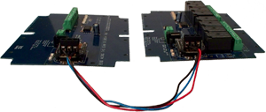 Connect the two boards up to 1000' feet with RJ11 Cable